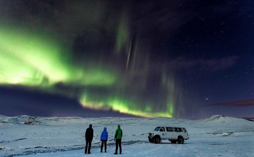 Explore a lava cave and tunnel and search for the Northern Lights