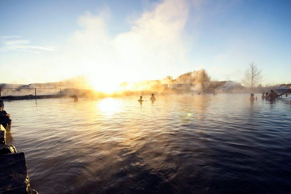Bath in the Secret lagoon in Iceland.