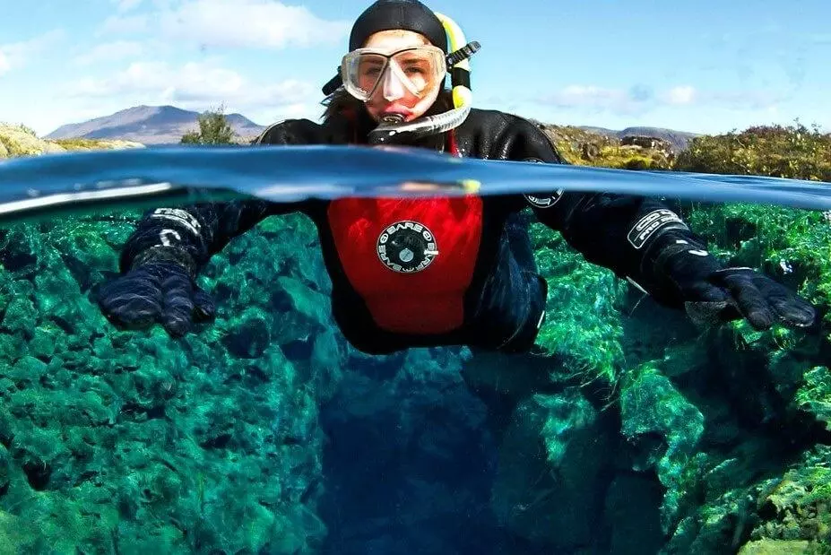 Snorkeling in the crystal waters of Silfra Snorkeling in Silfra tour in Iceland