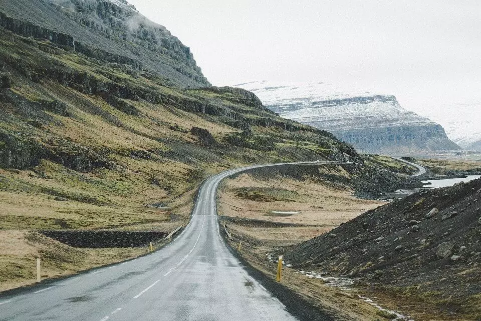 Driving in Iceland on open roads and far from anyone. 