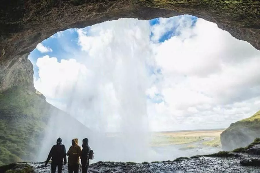 Inside the cave behind the Seljalandsfoss Waterfall in the South Coast of Iceland