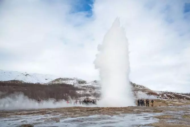 Strokkur Geyser erupting in the Golden Circle in Iceland